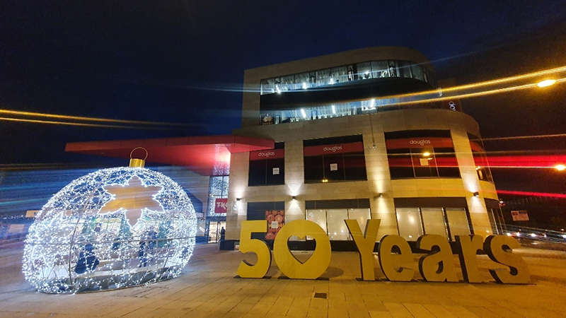 A decorative Christmas display marking Douglas Village Shopping Centre's 50th anniversary, located outside the shopping centre.